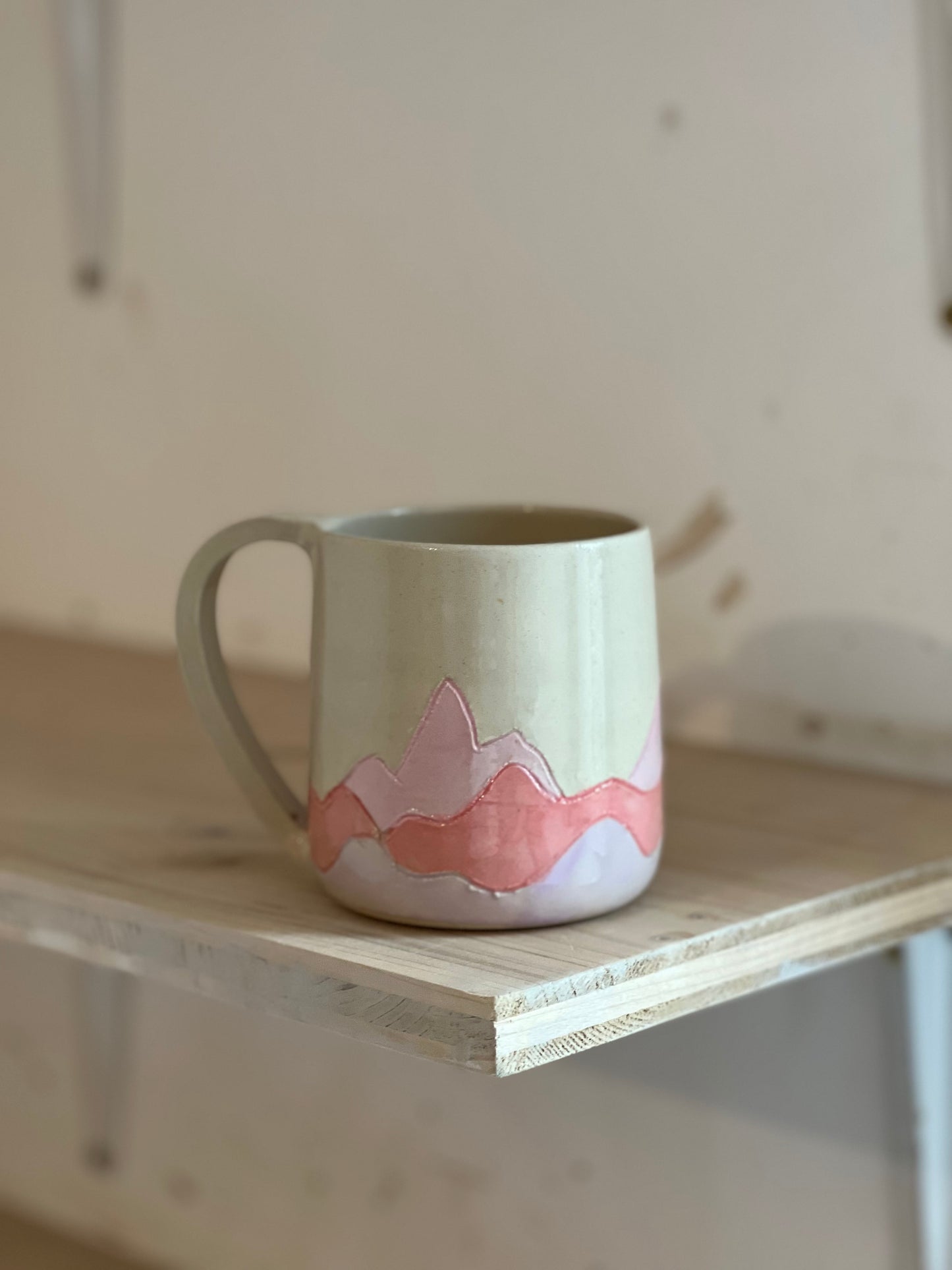 Tasse montagne couché de soleil