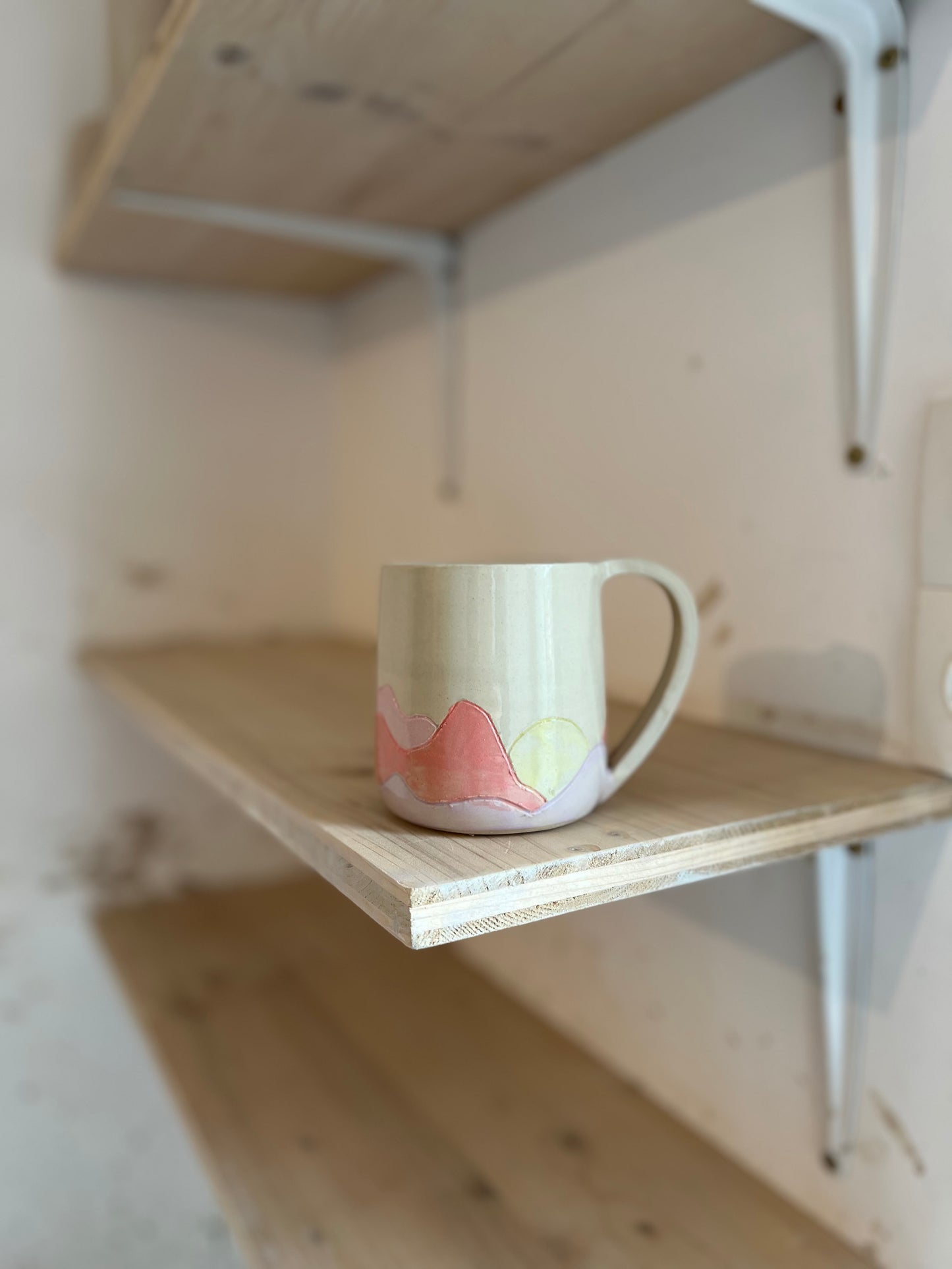 Tasse montagne couché de soleil